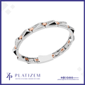 A silver-toned geometric bracelet with rose gold accents and clear stones, displayed on a white background with the brand logo 'PLATIZEM' at the bottom.