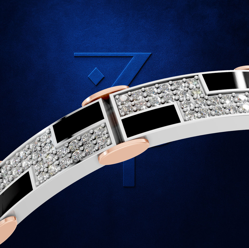 A close-up of a geometric bracelet featuring silver-toned and rose gold links, with pavé-set clear stones and black inlay sections, set against a textured dark blue background with a stylized number 7.