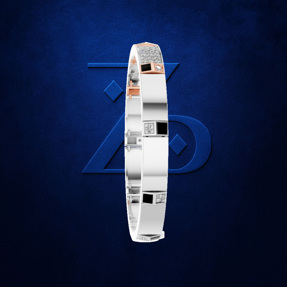 A slim white bangle bracelet with black and rose gold square accents, displayed vertically against a textured dark blue background with a subtle logo.