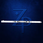 A white belt with a diamond-embellished center section and black arrow-shaped buckles, shown horizontally against a textured dark blue background with a large blue 'ZP' monogram.