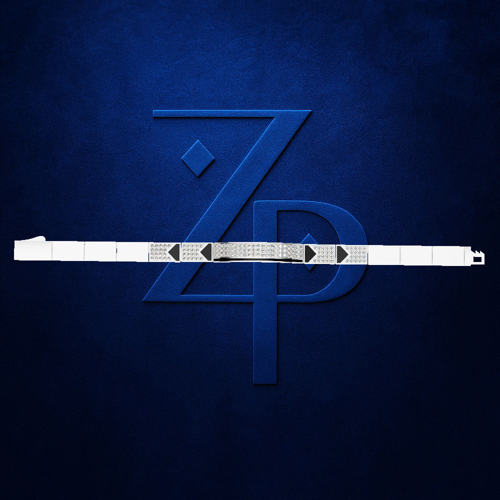 A white belt with a diamond-embellished center section and black arrow-shaped buckles, shown horizontally against a textured dark blue background with a large blue 'ZP' monogram.