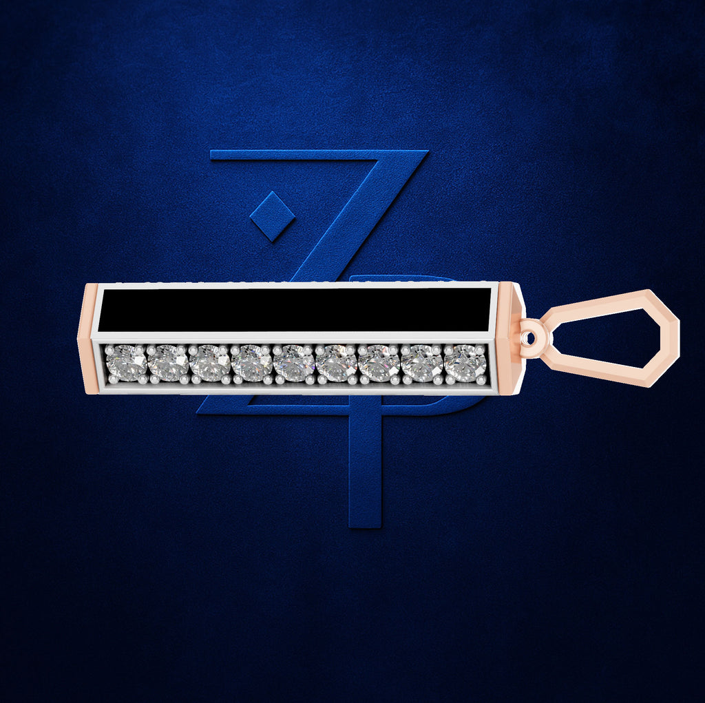 A rectangular pendant or keychain-style jewelry piece with a row of clear gemstones on a rose gold-toned base, shown against a dark blue textured background with a stylized blue 'Z' logo behind it.