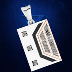 A rectangular pendant necklace featuring a white face with three inset square clear stones, a black chevron accent, and a rose gold-toned side panel with multiple clear rectangular stones, shown on a dark blue textured background.
