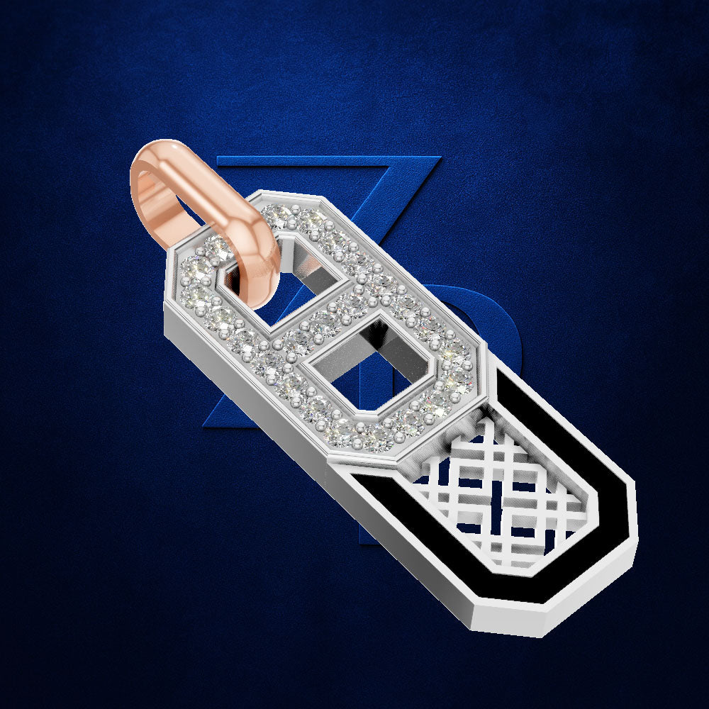 A silver-toned geometric pendant or key-shaped charm with clear stones, a rose gold loop at the top, and a black-and-white lattice pattern on one end, shown on a dark blue textured background.