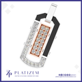 A custom-designed rectangular pendant with a silver-toned outer frame, a black inlay section, and a rose gold center panel set with clear gemstones. The brand logo 'PLATIZEM' is visible at the bottom of the image.