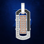 A luxury pendant necklace featuring a white gold or platinum frame set with clear diamonds, a central rose gold rectangular panel with diamond-cut stones, and a white bail, shown against a textured dark blue background.