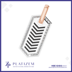A rectangular pendant charm with a rose gold top loop, featuring a white center with a black chevron pattern and a border of clear rhinestones, shown on a white background with the brand name PLATIZEM at the bottom.