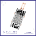 A rectangular platinum pendant with a central diamond-encrusted panel and chevron inlay details, accented by rose gold loops and side hardware, shown on a white background with the Platizem brand logo at the bottom.
