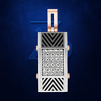 A rectangular pendant or watch-like jewelry piece with a silver-toned geometric face, black chevron and diamond-pattern panels, and rose-gold-toned side accents, centered on a dark blue textured background.