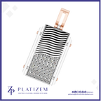 A rectangular platinum pendant with a wavy black and white enamel pattern and a pavé diamond-encrusted lower section, featuring rose gold-tone side accents and a top loop, shown on a white background with the Platizem brand logo.