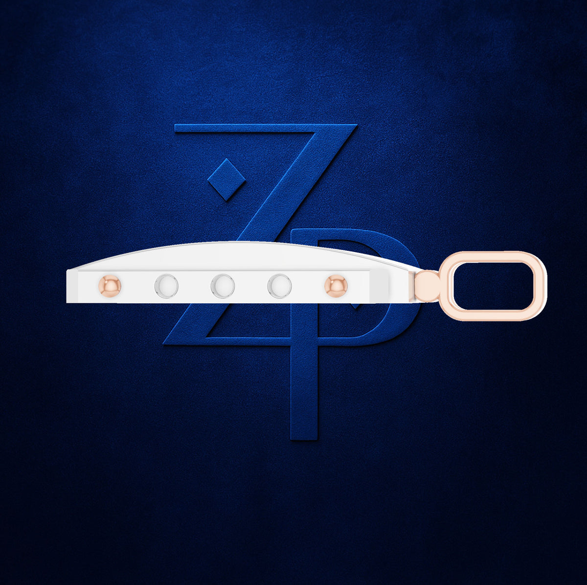 A white rectangular watch strap with rose gold-toned hardware and a matching loop clasp, shown against a dark blue textured background with a large embossed stylized 'ZP' logo.