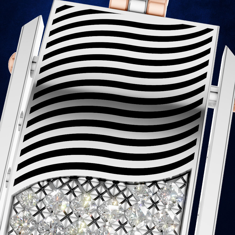Close-up of a silver-toned jewelry piece with a wavy black-and-white striped top and a row of clear faceted stones along the bottom, shown against a dark blue background.