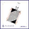 A rectangular pendant necklace by Platisem, featuring a diamond-encrusted center with black inlay and rose gold borders, shown on a white background with the brand logo at the bottom.