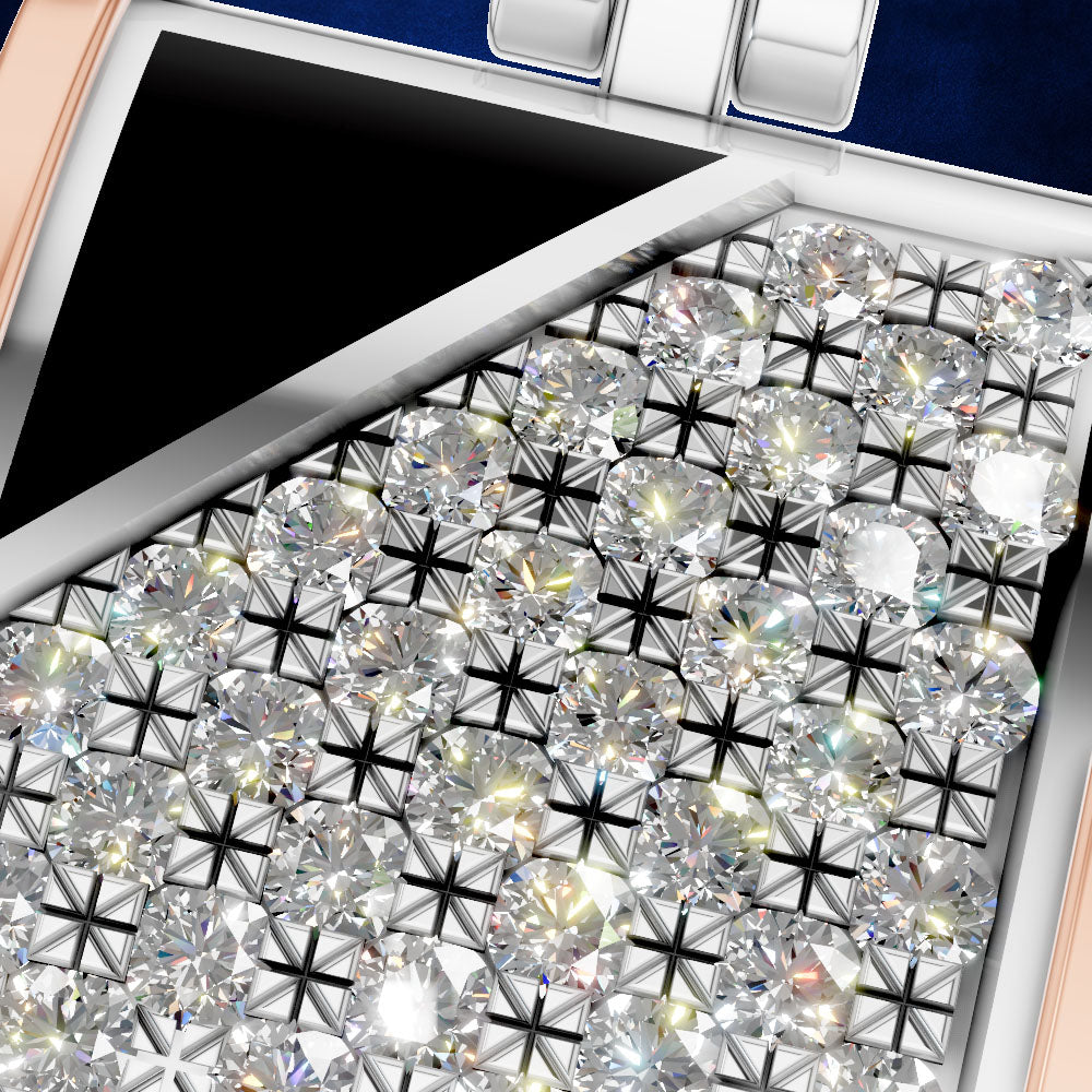Close-up of a luxury watch dial featuring a large array of clear round-cut diamonds in a star-shaped bezel setting, with a rose gold-toned case edge and a dark blue inner crown guard.