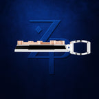 A modern key-shaped accessory with a metallic silver handle and a top bar featuring rose gold and black segments, presented against a textured dark blue background with a stylized blue 'ZPD' logo.