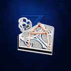 An ornate geometric jewelry piece featuring a rectangular silver-toned base with intricate white and blue sculpted patterns, connected by rose gold triangular bars, with a white ring element rising from the back, set against a dark blue textured background.