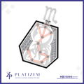 A hexagonal pendant necklace featuring a rose gold astrological symbol set with clear gemstones, bordered in black with pavé-set clear stones, shown on a white background with the brand name 'PLATIZEM' at the bottom.