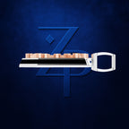 A modern, stylized digital illustration of a keyboard with a white handle and copper-colored keys, positioned horizontally in front of a large blue stylized 'ZP' monogram on a textured dark blue background.