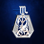 A hexagonal pendant necklace featuring a white and navy blue zodiac symbol for Libra, embellished with rose gold and diamond constellations, set against a textured dark blue background.