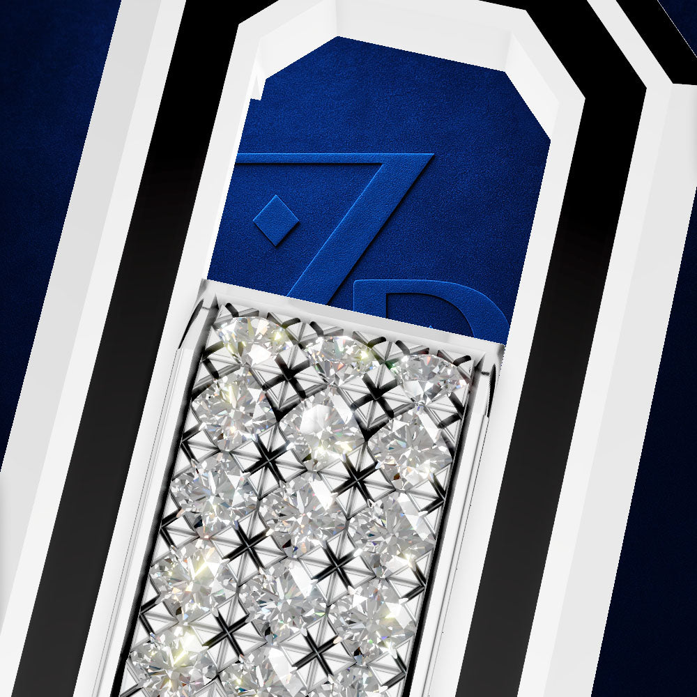 Close-up of a luxury jewelry piece featuring a rectangular array of clear pavé diamonds in a silver-toned setting, set against a deep blue textured background with bold white and black geometric borders.