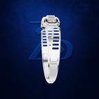 A white structured watch band with a central crystal and small orange accent, shown against a dark blue textured background with a subtle blue geometric logo.