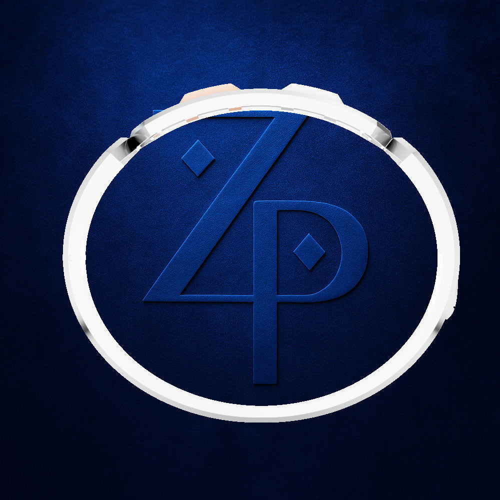 A circular metallic emblem with a stylized interlocking 'Z' and 'P' monogram in dark blue, set against a textured dark blue background.