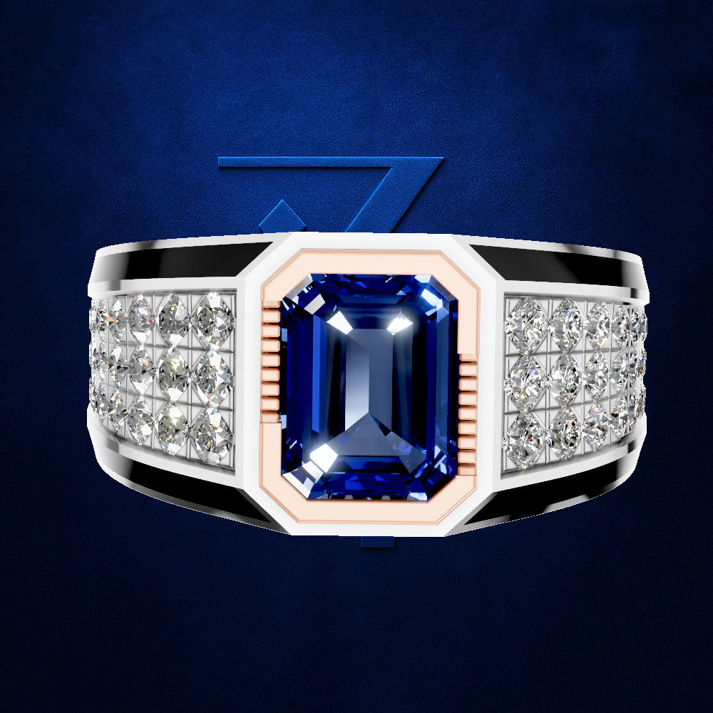 A men's statement ring featuring a large emerald-cut blue sapphire center stone, flanked by rows of clear pavé diamonds on a white gold or platinum band with black accents, set against a dark blue textured background.