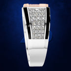 A men's minimalist watch with a polished silver-tone metal band and case, featuring a rectangular bezel set with clear pavé diamonds and accented by black inlays, against a dark blue textured background.