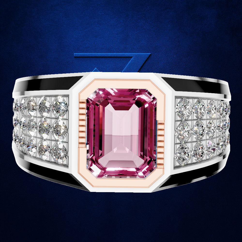 A wide band ring featuring a large rectangular emerald-cut pink gemstone in the center, flanked by rows of clear pavé and round-cut stones on a polished silver-toned band with black inlay details, set against a dark blue textured background.