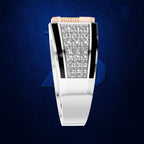 A men's minimalist watch with a wide white ceramic band, a black bezel, and a central diamond pavé face. The top of the dial features a rose gold accent bar with a gold-plated crown.