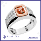 A platinum ring featuring a large emerald-cut orange gemstone in a rose gold bezel, with a silver-colored band accented by pavé-set clear crystals. The brand logo 'Platizem' is visible at the bottom of the image.