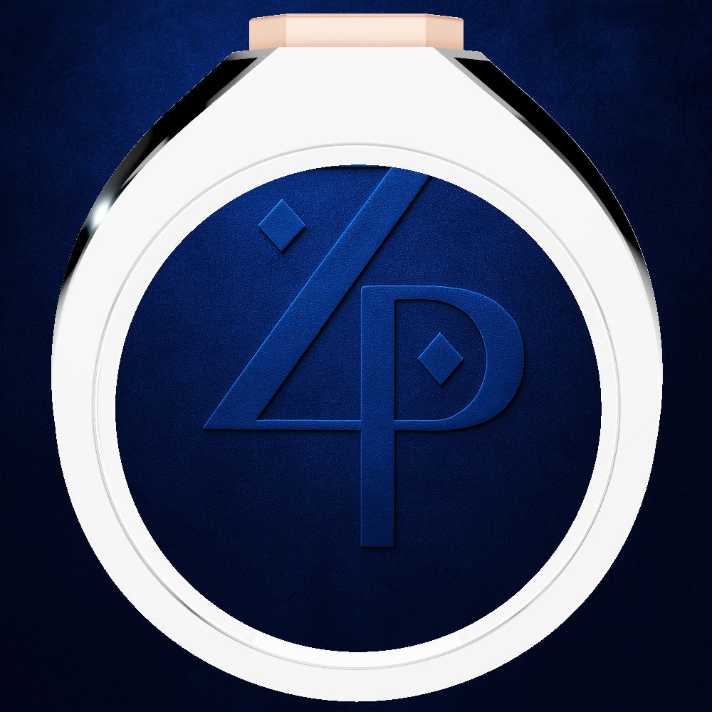 A close-up of a round cosmetic compact or powder pan with a white outer rim and a deep navy blue center featuring an embossed stylized '4P' logo. The top edge shows a small portion of a light peach-toned cap.