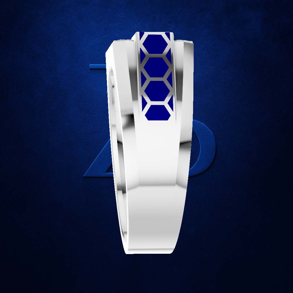 A polished silver ring featuring a central geometric design with a blue and gold honeycomb pattern, set against a dark blue textured background.