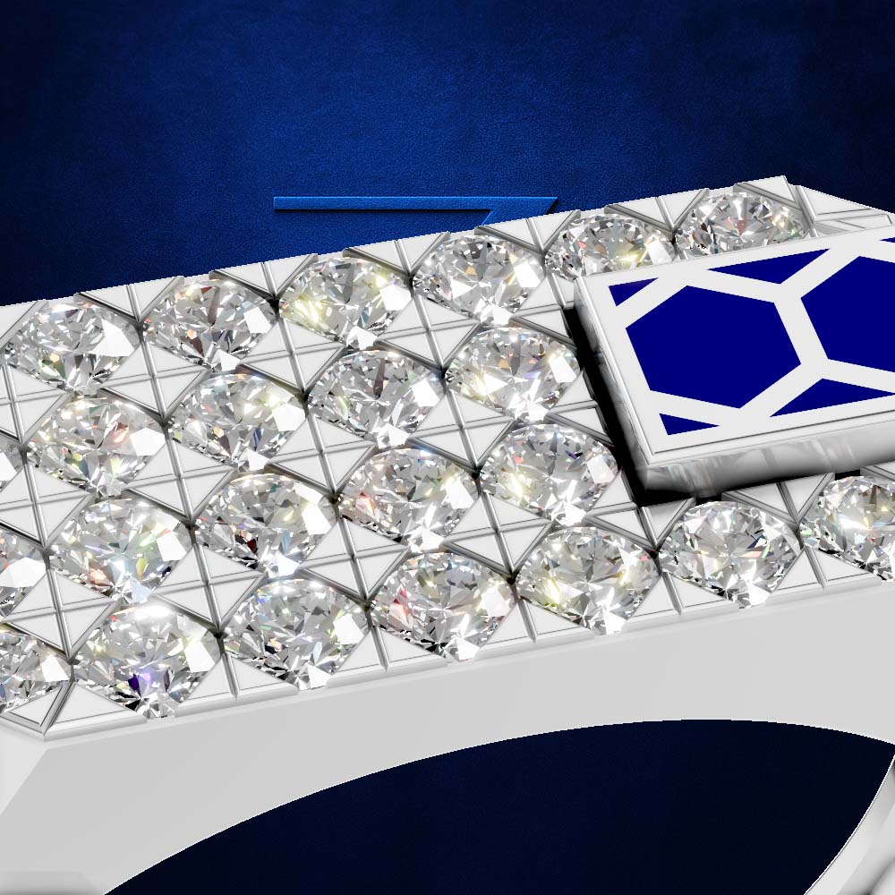 A close-up of a white geometric ring or bracelet featuring multiple clear faceted gemstones arranged in a grid, with a square inset showing a blue geometric pattern on a white background.