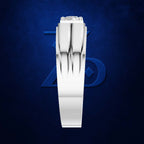 A polished silver-toned ring with a single round clear gemstone, shown vertically against a textured dark blue background with a subtle logo behind it.
