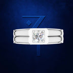 A white gold or platinum ring featuring a square-cut clear gemstone in a prong setting, presented against a textured dark blue background with a stylized blue number 7 behind it.