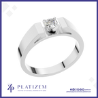 A silver-toned solitaire engagement ring with a round-cut diamond, shown on a white background with the Platizem brand logo at the bottom.