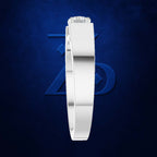A minimalist white band ring with a single round-cut clear gemstone, shown in a side profile against a textured dark blue background with a subtle geometric logo.