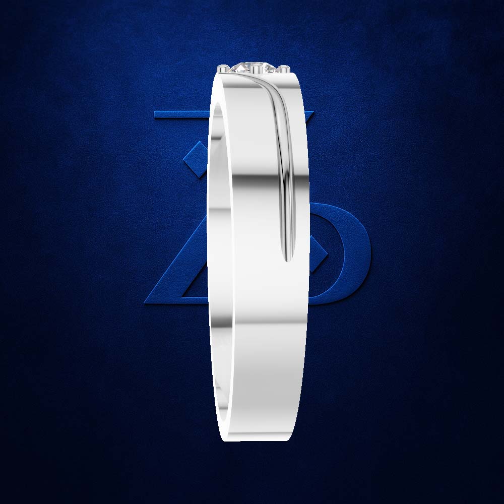 A polished silver band ring with a curved channel setting holding a single small clear gemstone, shown upright against a dark blue textured background with a subtle blue geometric logo behind it.