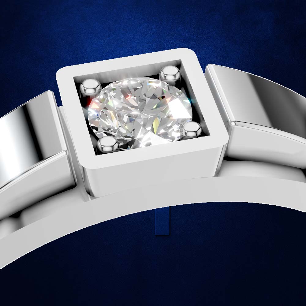 A close-up of a silver-toned ring with a square bezel holding a large clear round gemstone, set against a deep blue background.