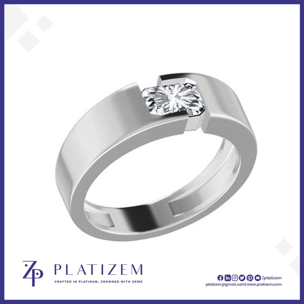 Emerald Cut Diamond Ring Held Securely in a Sleek Tension Setting