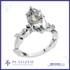 A platinum engagement ring featuring a large marquise-cut clear gemstone in a prong setting, with a detailed filigree band. The brand logo 'PLATIZEM' is visible at the bottom of the image.