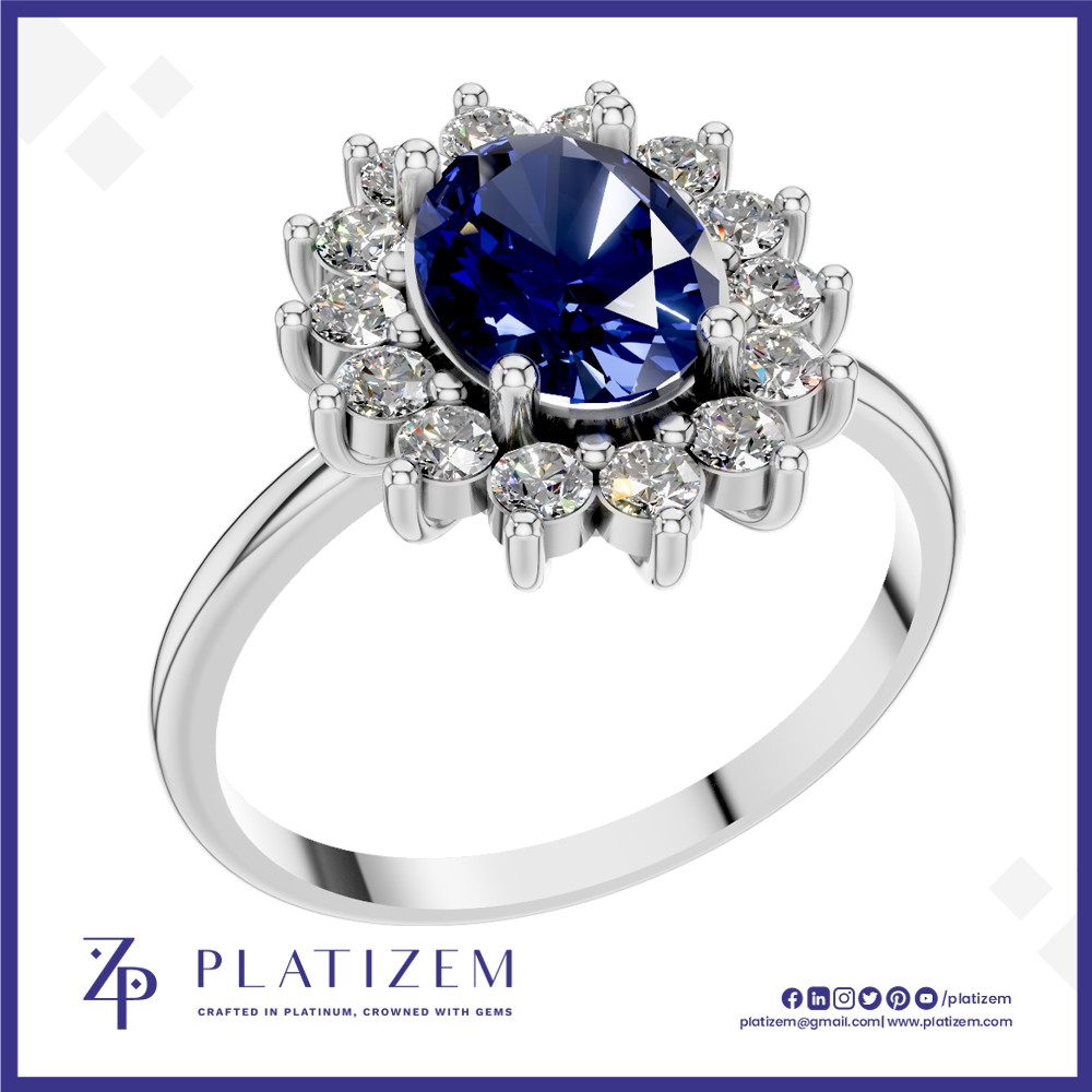 A platinum ring featuring a large oval-cut deep blue sapphire center stone, surrounded by a halo of round brilliant-cut clear diamonds, set on a polished silver-colored band. The brand logo 'PLATIZEM' is visible at the bottom of the image.