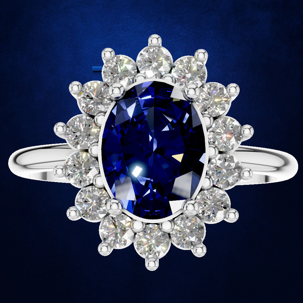 An oval-cut blue sapphire ring set in a halo of round-cut clear diamonds on a polished silver band, presented against a dark blue textured background.