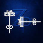 A pair of silver-toned stud earrings with a small dark blue gemstone, shown from front and side angles against a textured dark blue background with a stylized 'ZP' logo.