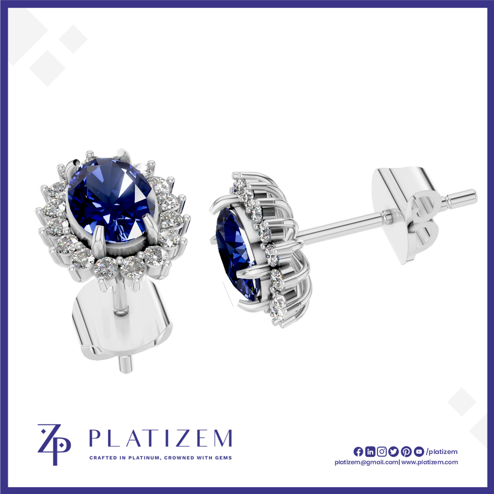 A pair of silver stud earrings with oval-cut deep blue gemstones and small clear accent stones, shown on a white background with the PLATIZEM brand logo at the bottom.
