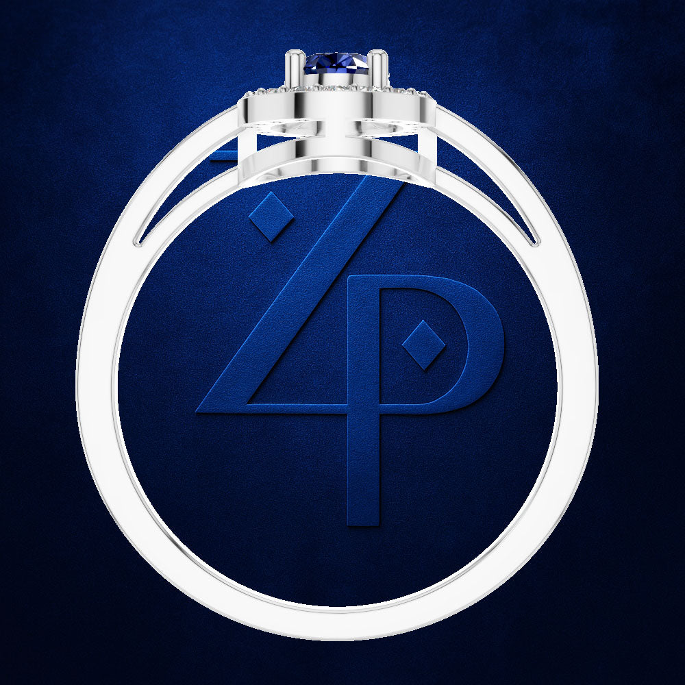 A silver-toned ring with a high-polish band and a central gemstone, shown against a dark textured blue background with a large stylized '4P' monogram behind it.