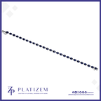 A silver-toned tennis bracelet with dark blue oval-cut stones, shown diagonally on a white background with the brand name 'PLATIZEM' at the bottom.