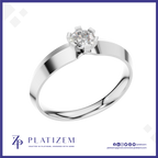 A classic six-prong solitaire engagement ring in polished white gold or platinum, featuring a round brilliant-cut diamond. The ring is presented on a white background with a blue border and the brand logo 'PLATIZEM' at the bottom.