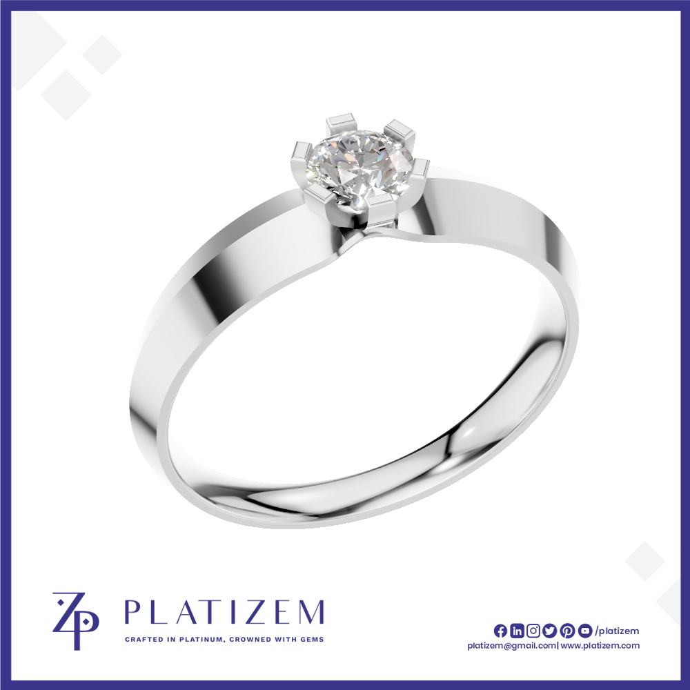 A classic six-prong solitaire engagement ring in polished white gold or platinum, featuring a round brilliant-cut diamond. The ring is presented on a white background with a blue border and the brand logo 'PLATIZEM' at the bottom.